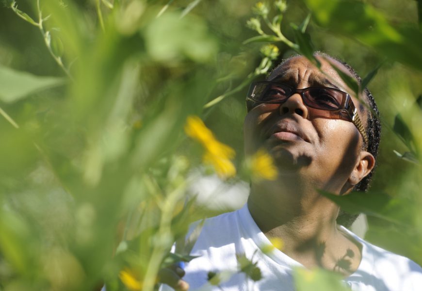 Rodette Jones, a city police dispatcher, tends a plot in the Filbert Street Garden